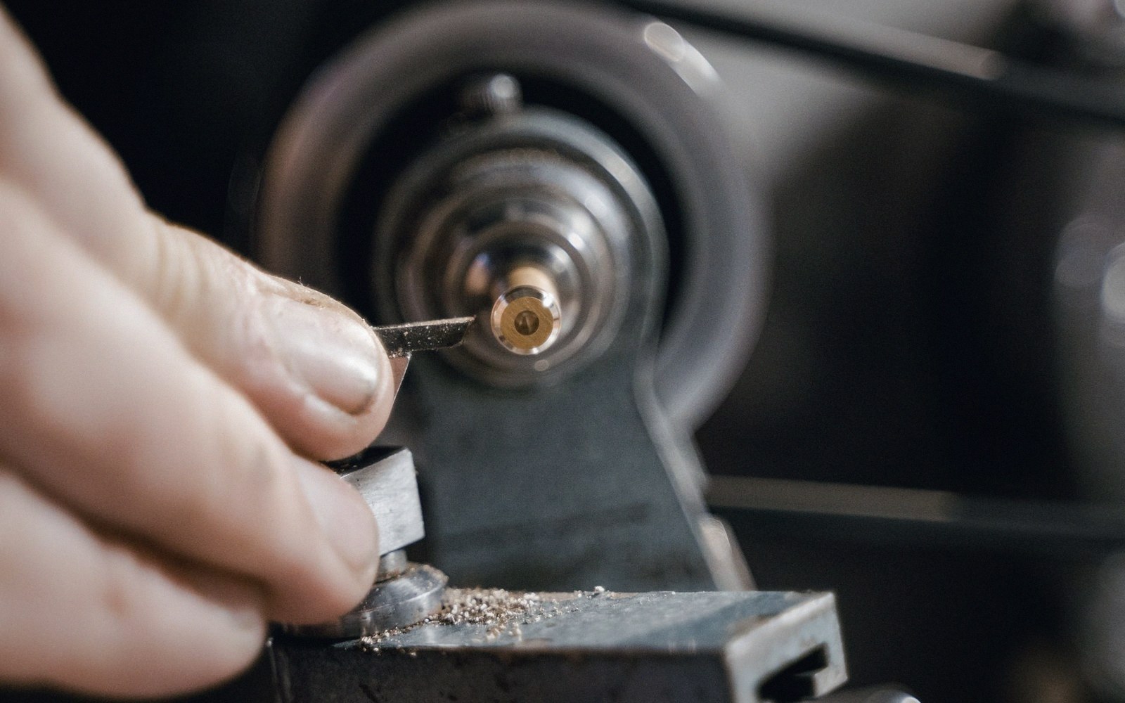 A watchmaker's lathe with a collet and graver rest